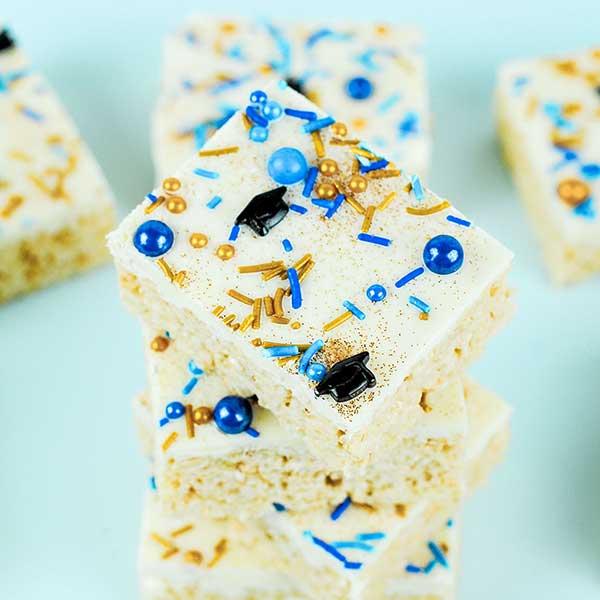 decorated graduation cap rice krispie treats on a platter