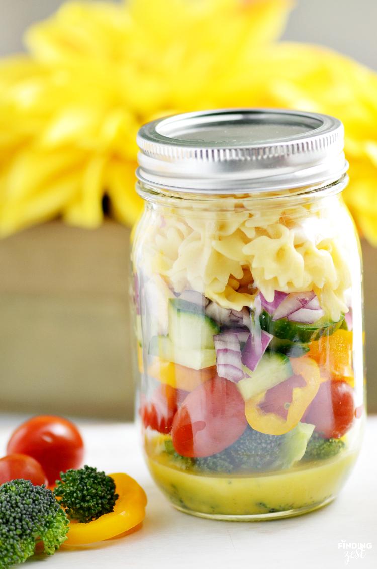 yogurt dill pasta salad served in mason jars for a picnic