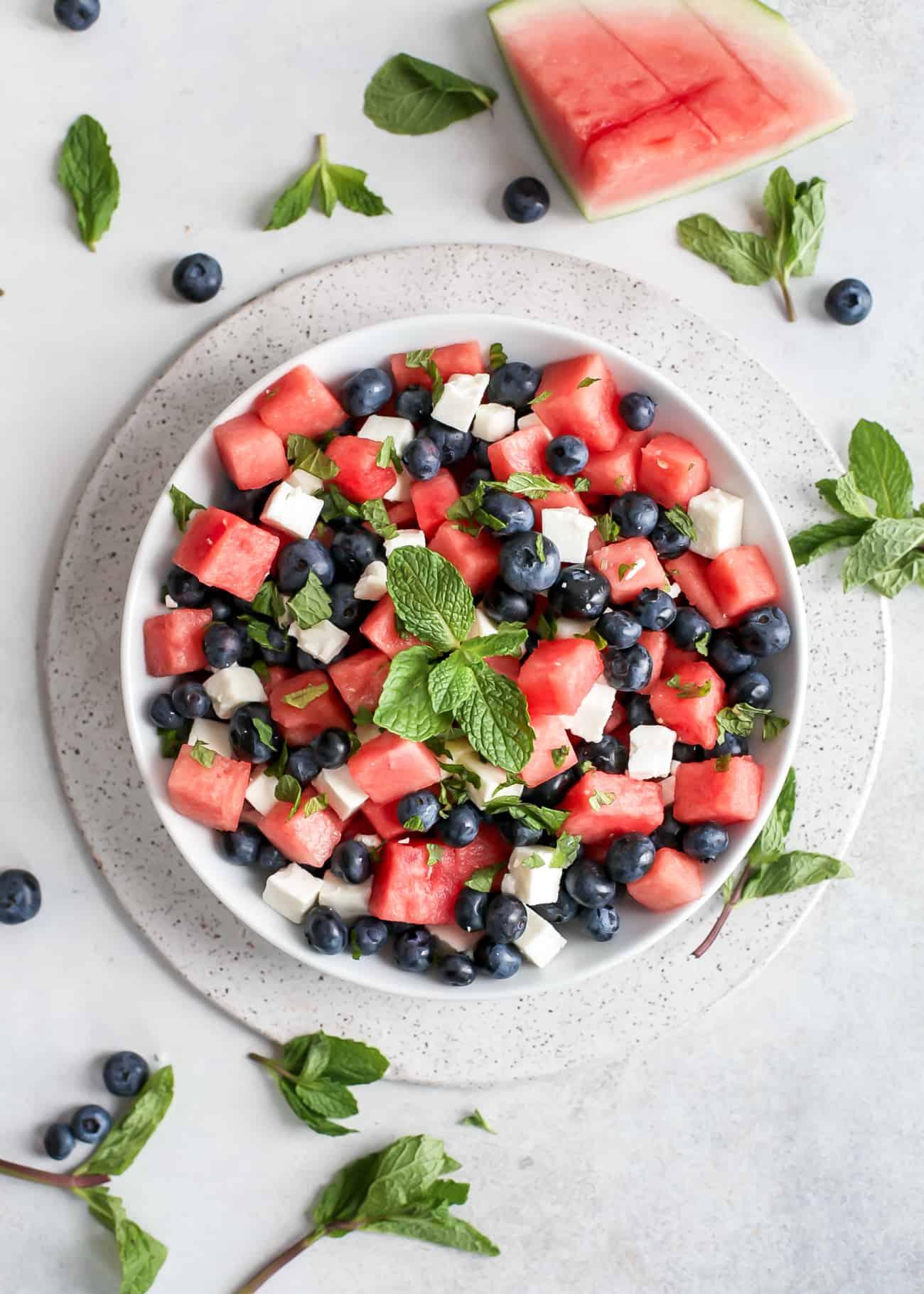 refreshing watermelon blueberry salad with goat cheese and almonds