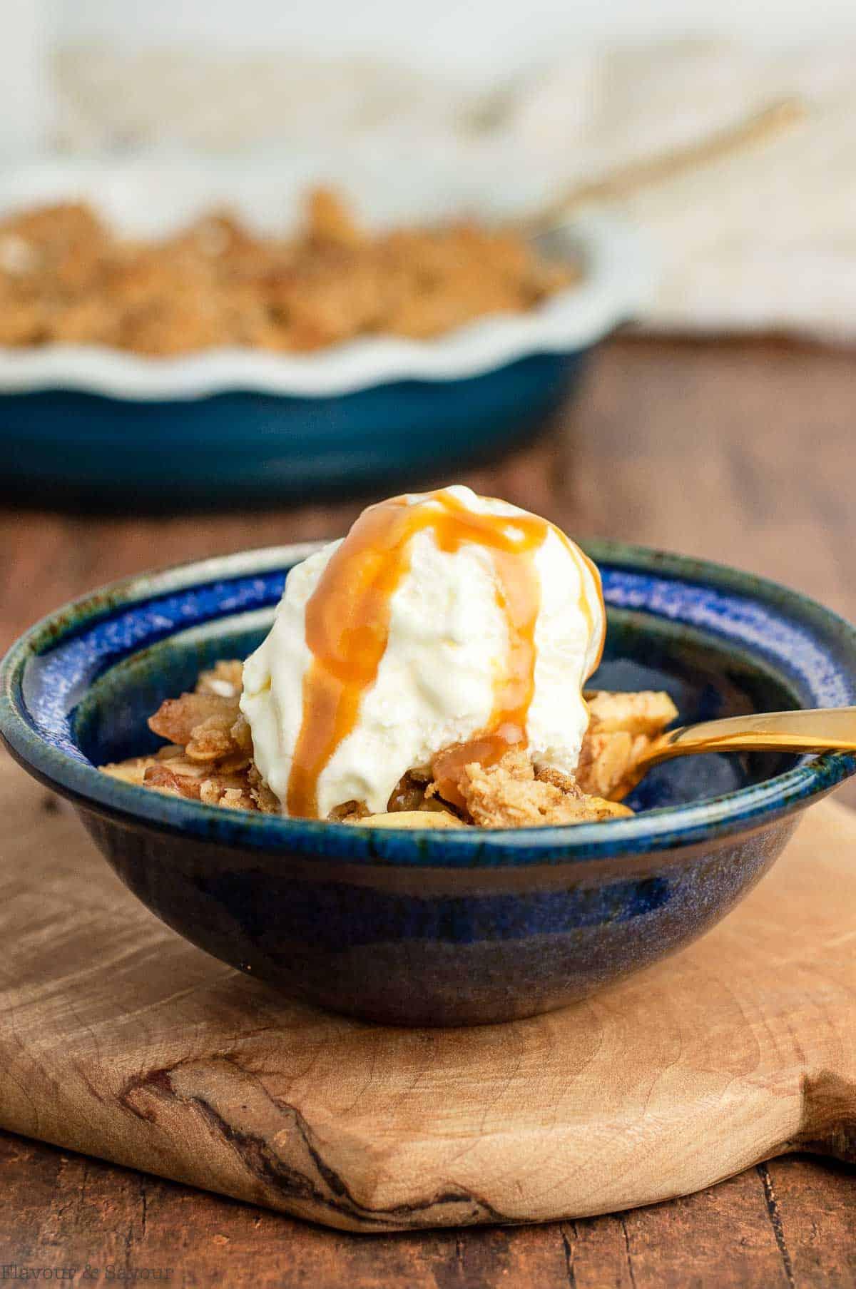 golden brown apple crisp with whiskey caramel drizzle