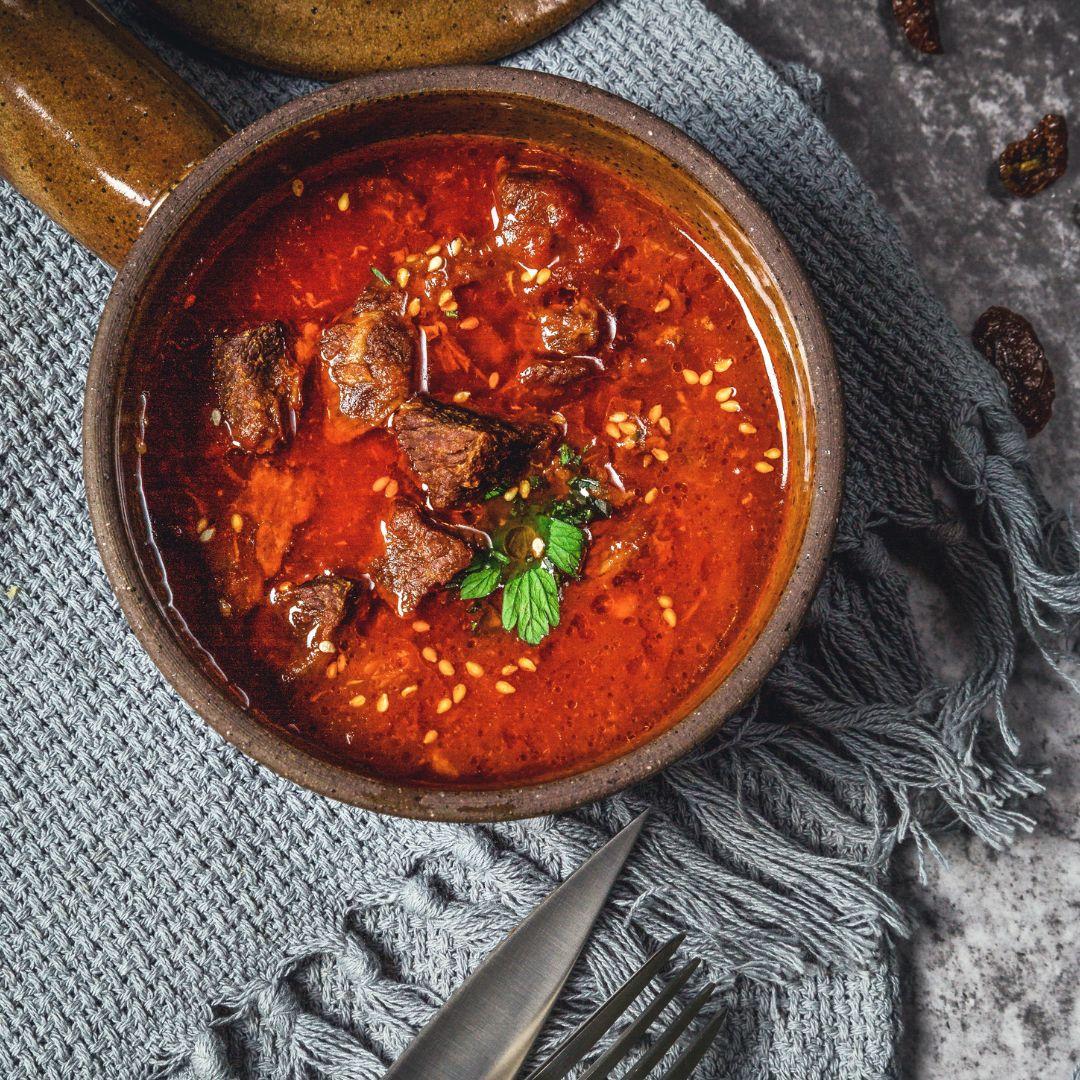 Close-up of wild boar pieces in the curry
