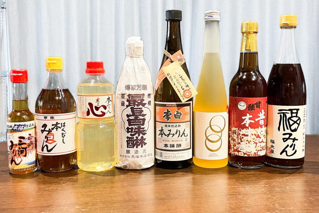 close-up of sake and mirin bottles with traditional Japanese labels