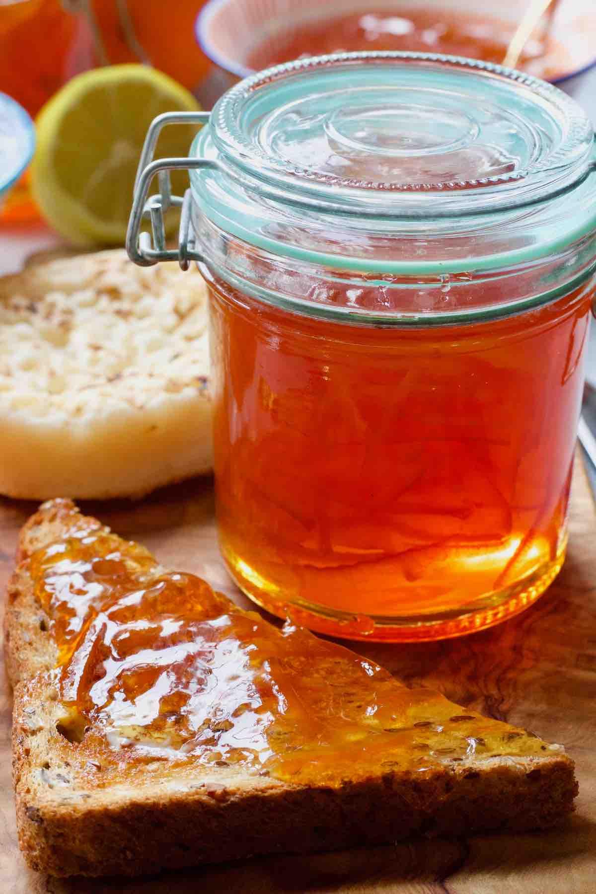 Seville orange marmalade with strawberries and bananas on toast