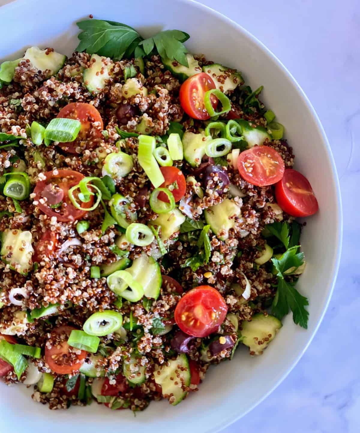 close-up of quinoa salad highlighting the texture and ingredients