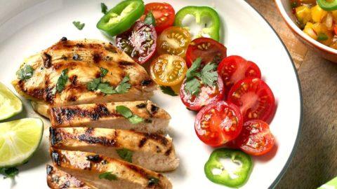 a chef preparing margarita chicken marinade with lime juice, tequila, and spices