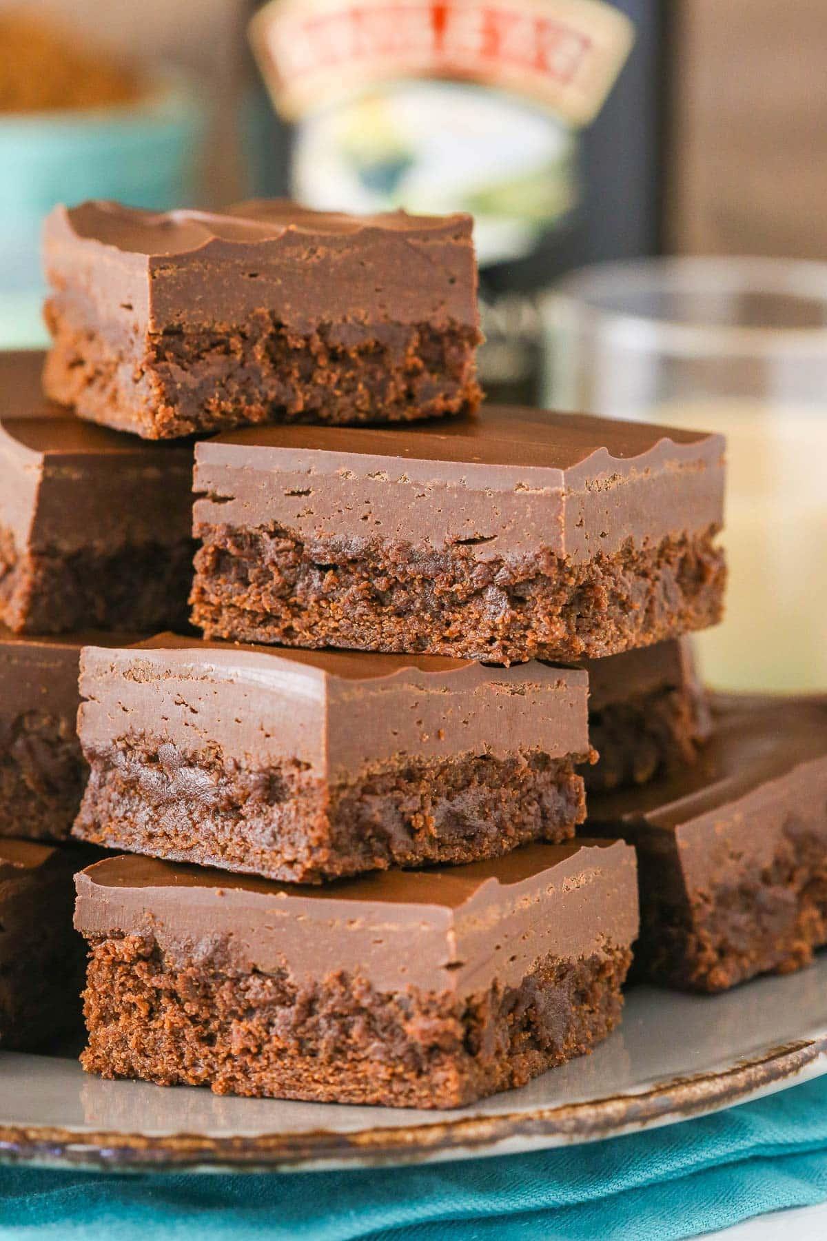 Close-up shot of a stack of Baileys brownies, showing the fudgy texture.