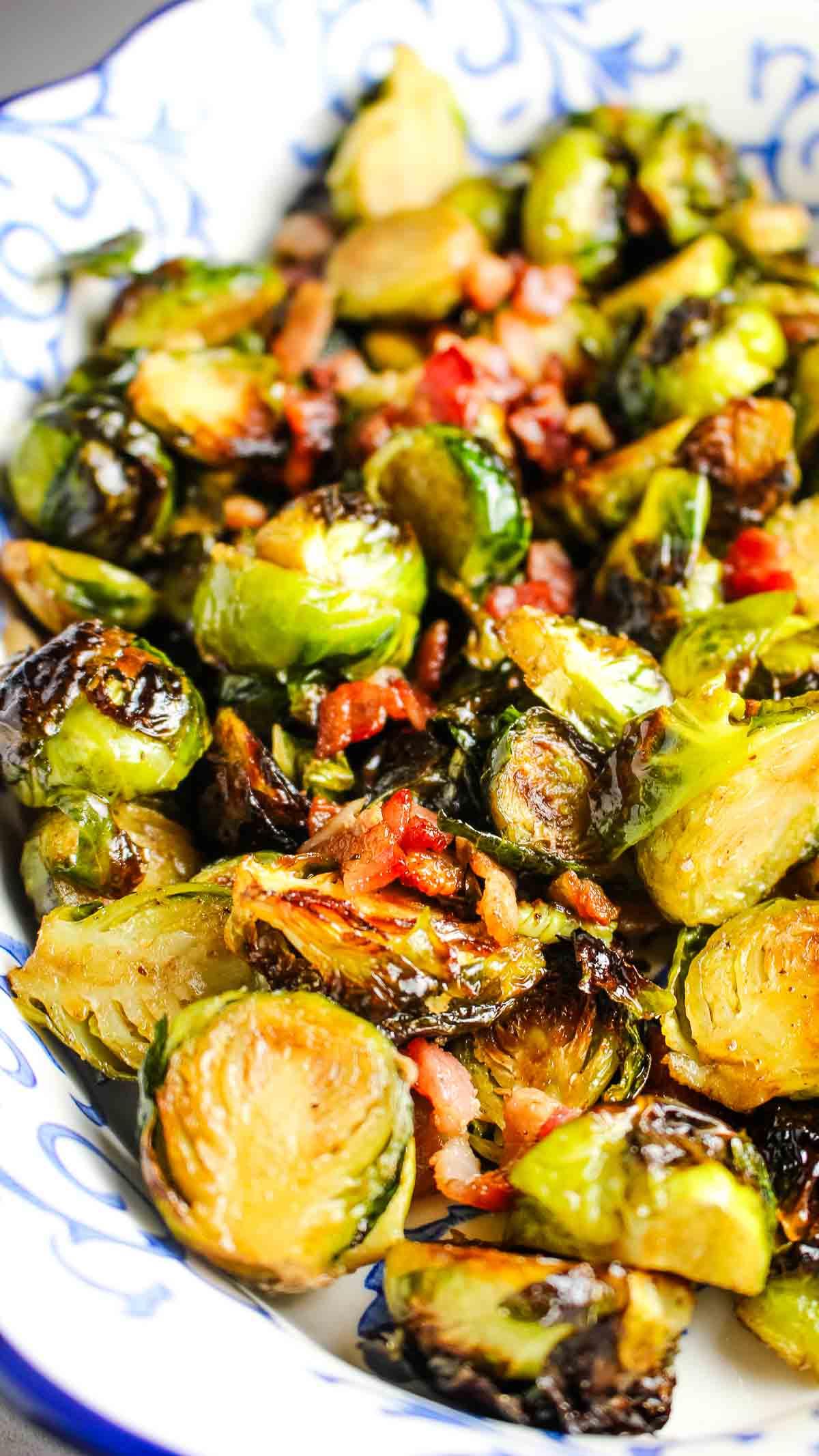 close up shot of zucchini and brussels sprout bake with bacon and maple syrup