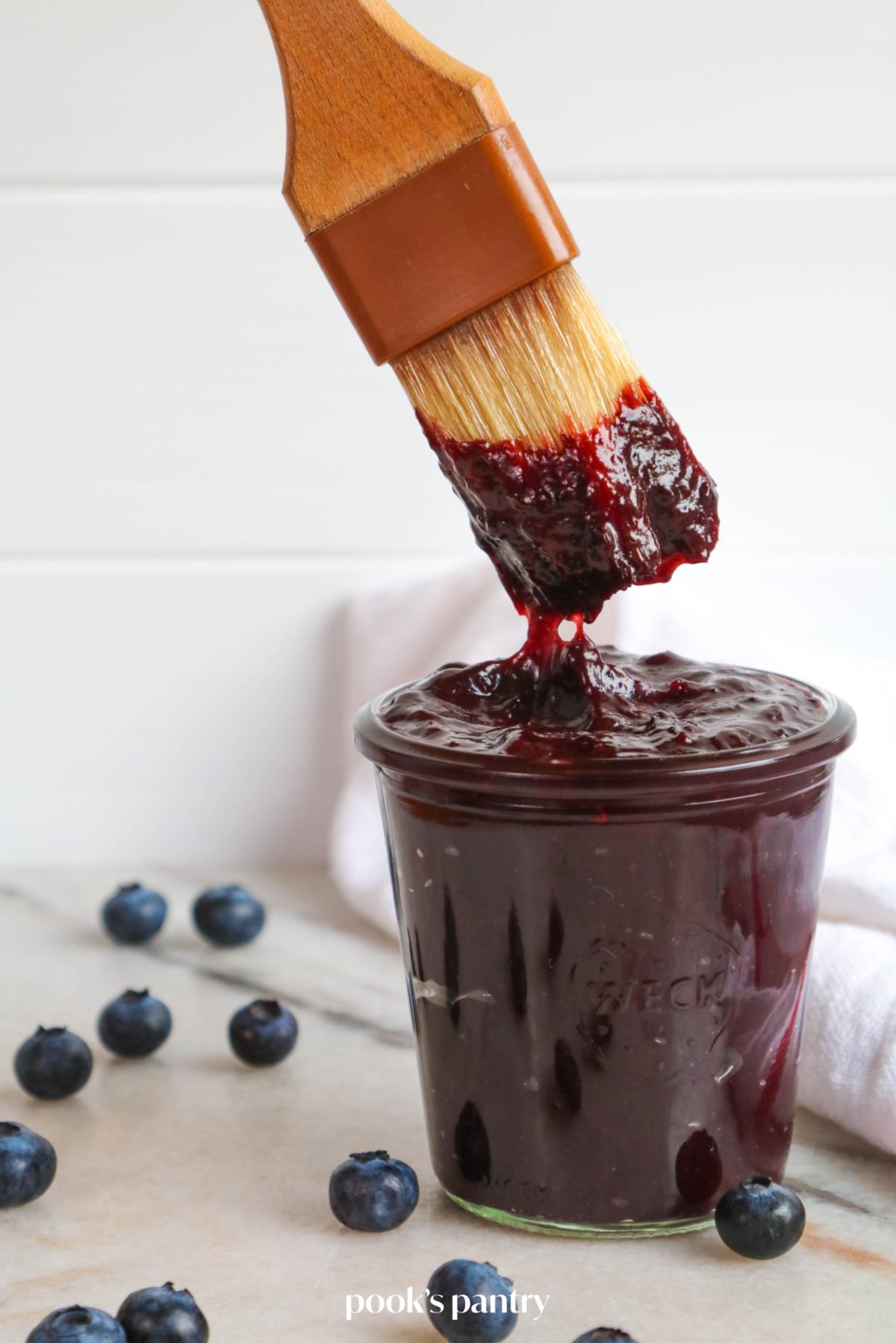 homemade blueberry bbq sauce in a glass jar