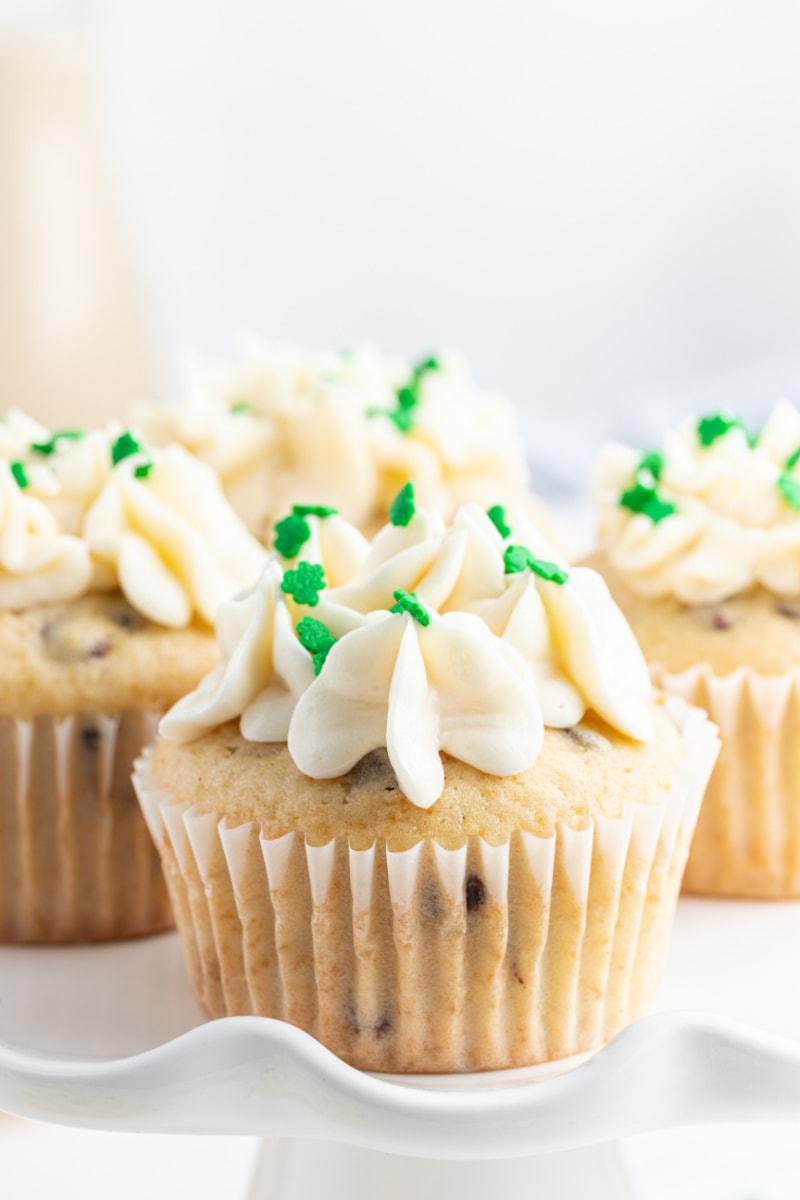close-up of a mini Irish cream cupcake with a swirl of frosting