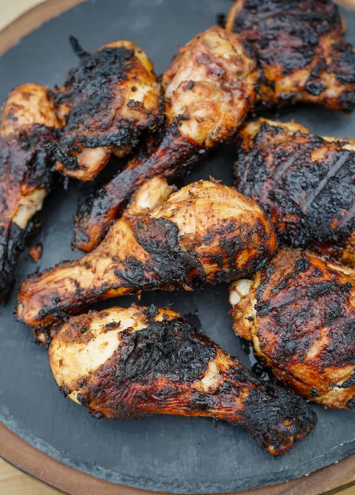 Close-up of jerk chicken being marinated