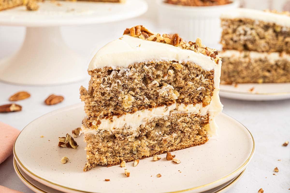 nectarine hummingbird cake sliced on a plate