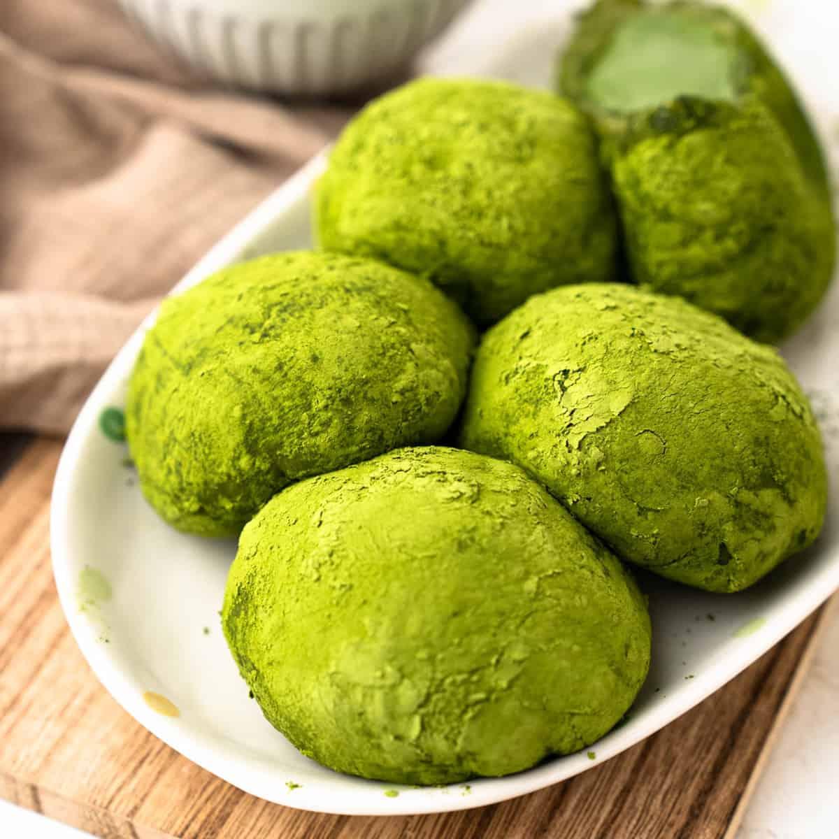 Various matcha mochi ingredients, including glutinous rice flour and matcha powder
