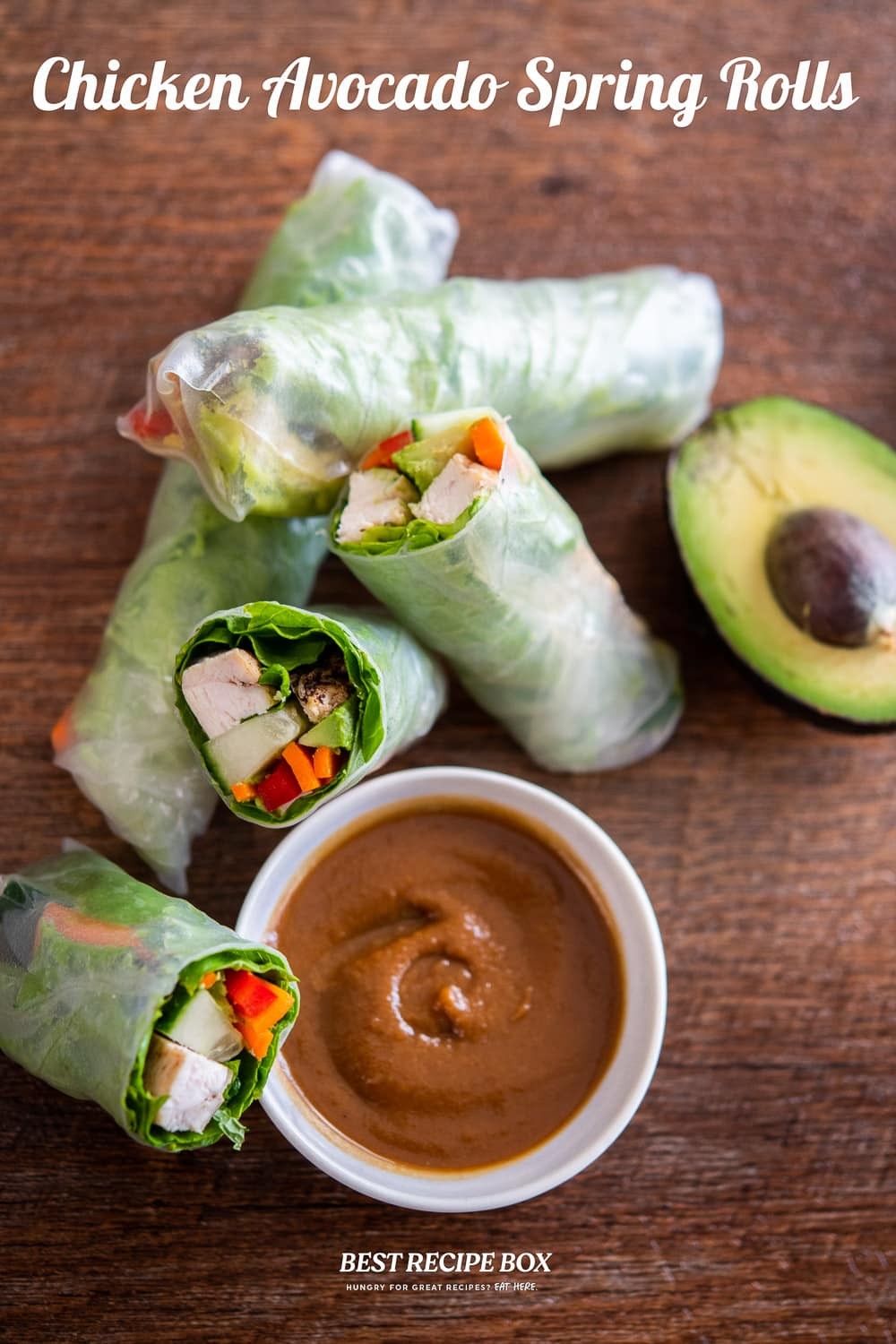 close up of freshly made chicken and avocado spring rolls