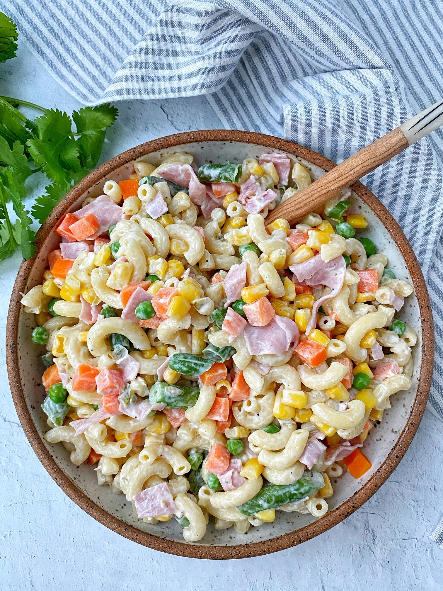 colorful summer macaroni pasta salad in a bowl