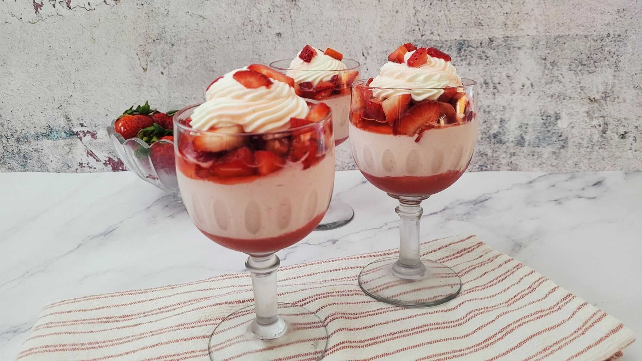 layered strawberry mousse parfait in a glass