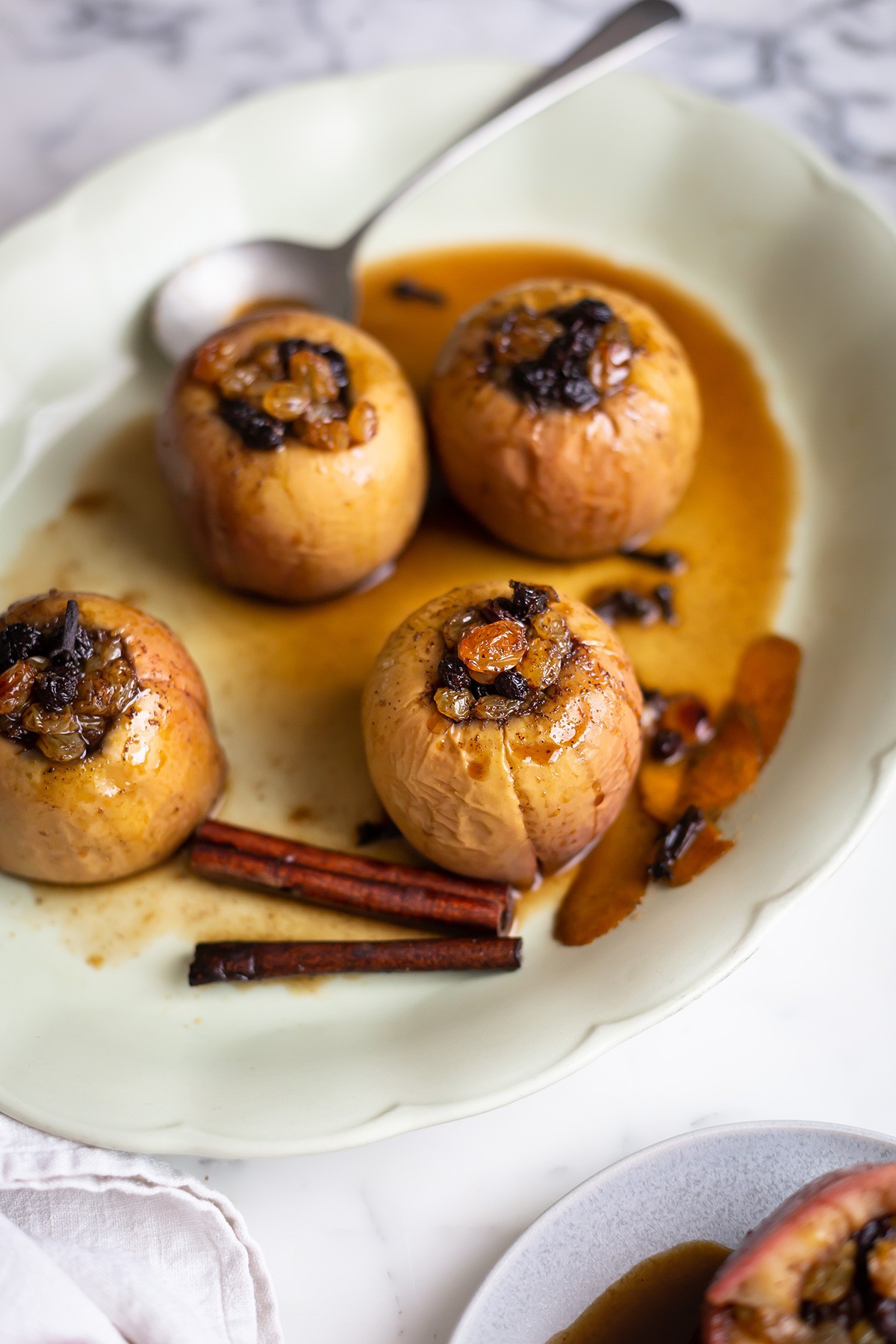 spiced apple baked apples with brandy being served
