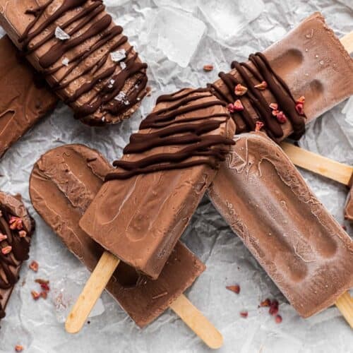 dark chocolate sea salt popsicles on a wooden background