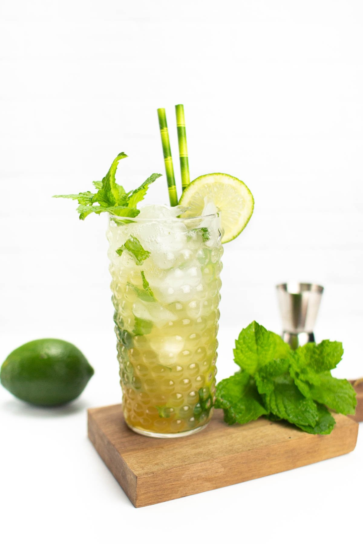 golden yellow virgin mojito with mint and lime
