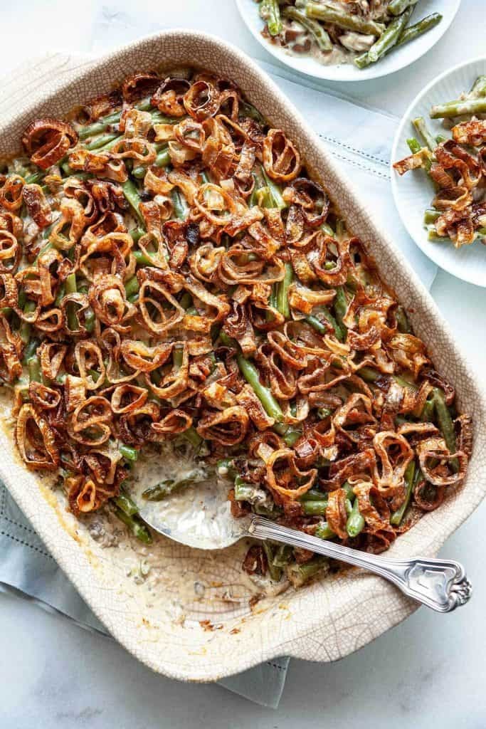 Delicious crispy green bean casserole with a golden brown topping, holiday food