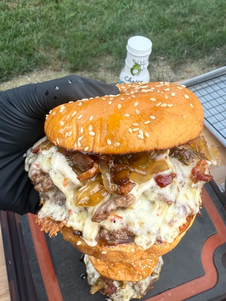 close up of griddle smash burgers with bacon jam