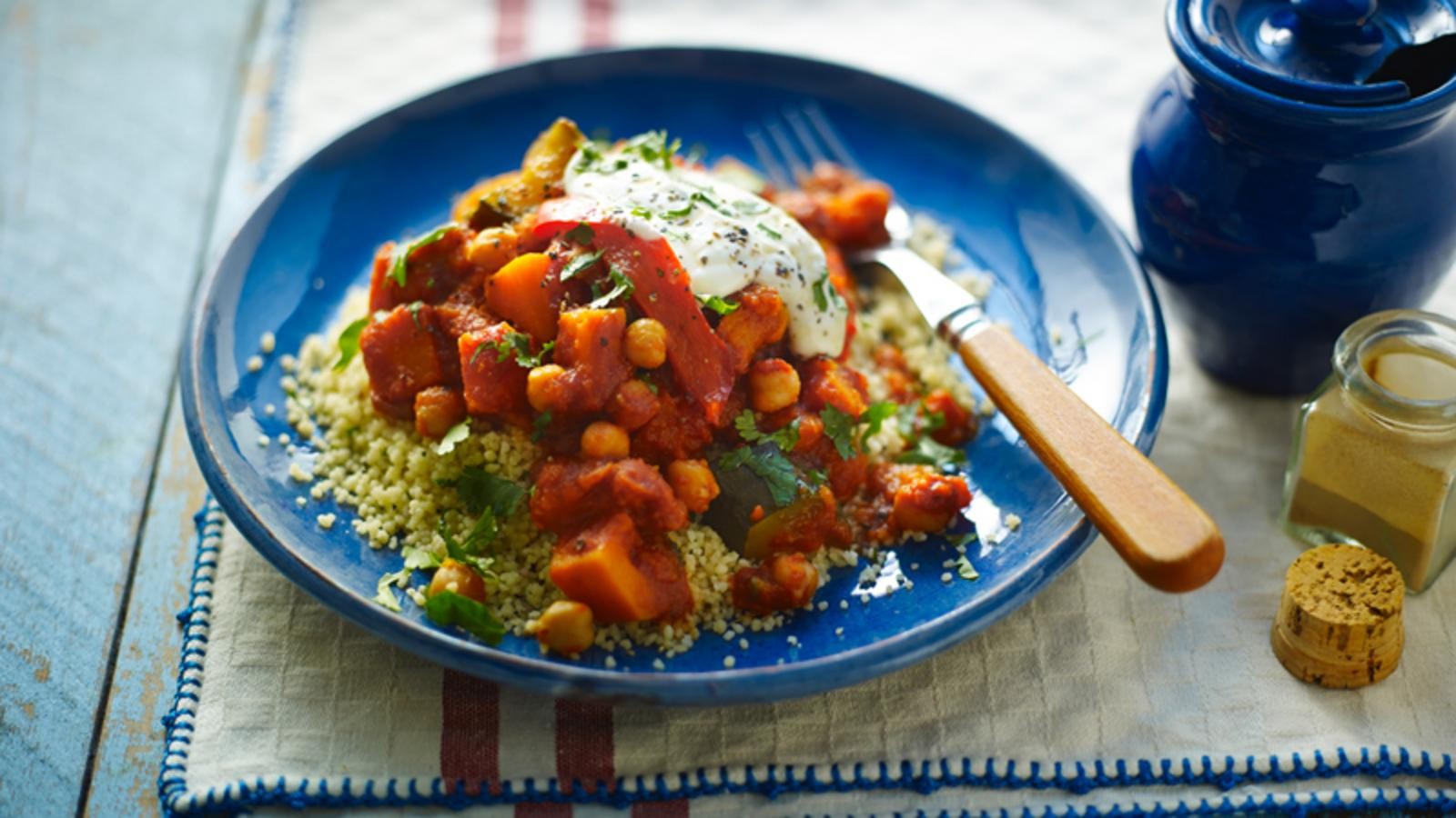 overhead shot of a colorful vegetable tagine in a crockpot