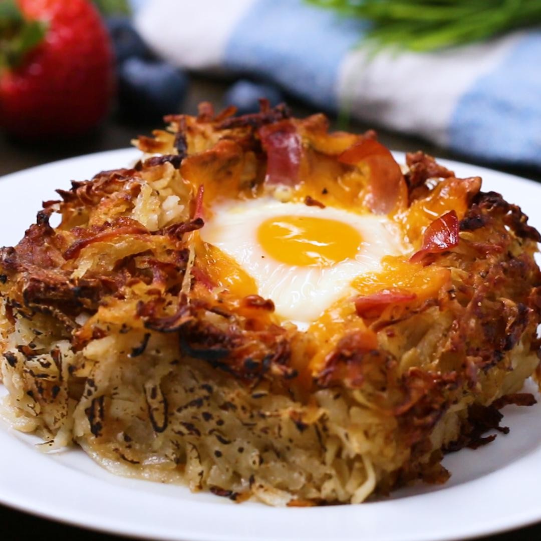 Sunrise Hash Brown Bake with golden crispy top, eggs, and melted cheese, served for breakfast
