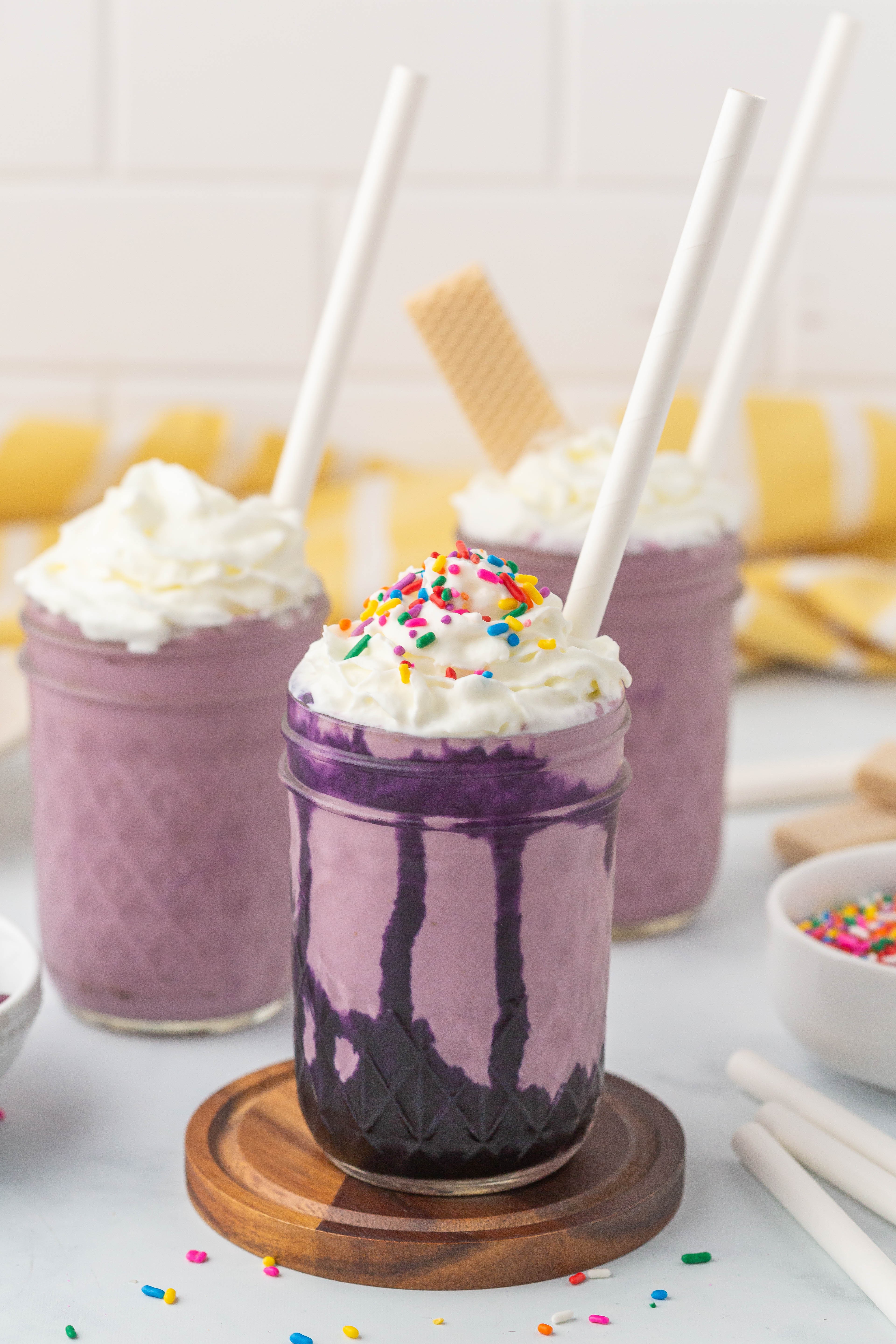 ube milkshake with whipped cream and ube halaya