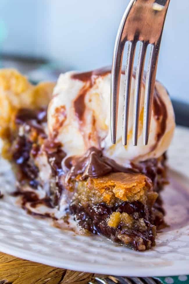 warm gooey chocolate chunk cookie pie slice with ice cream