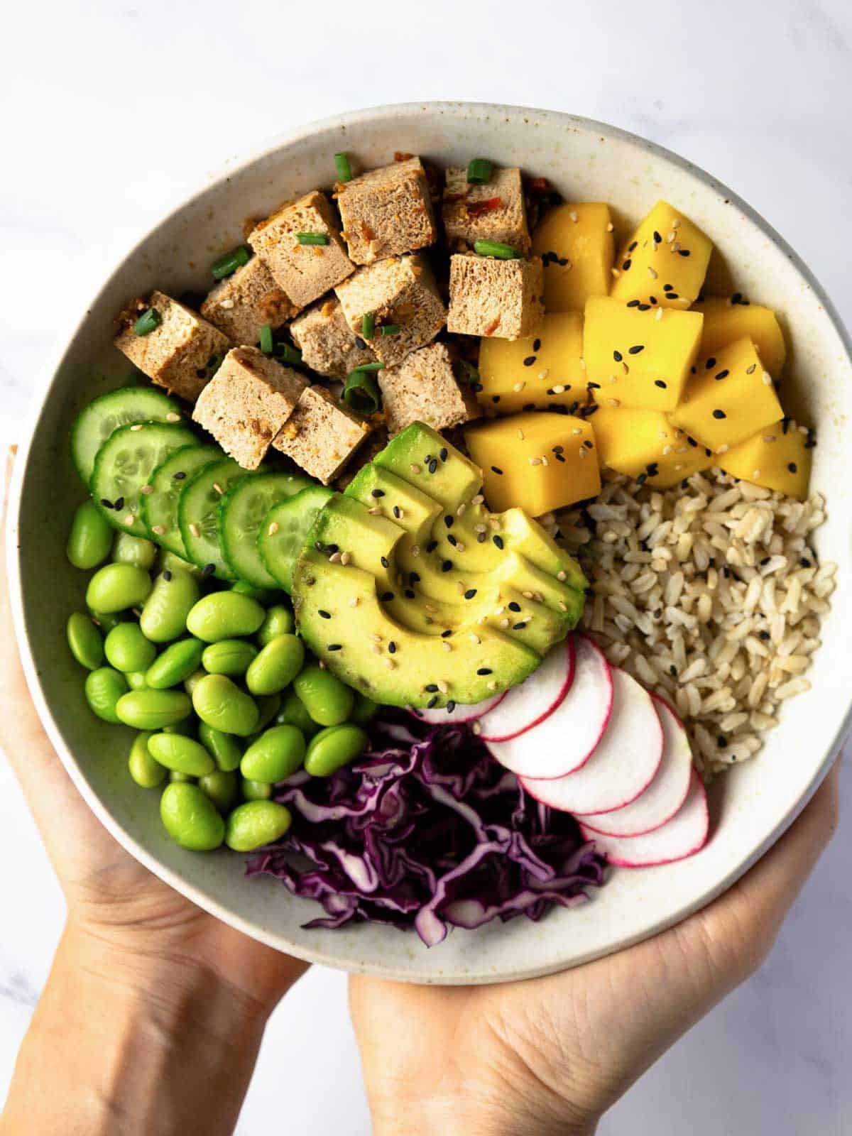rainbow quinoa sushi bowl with colorful toppings