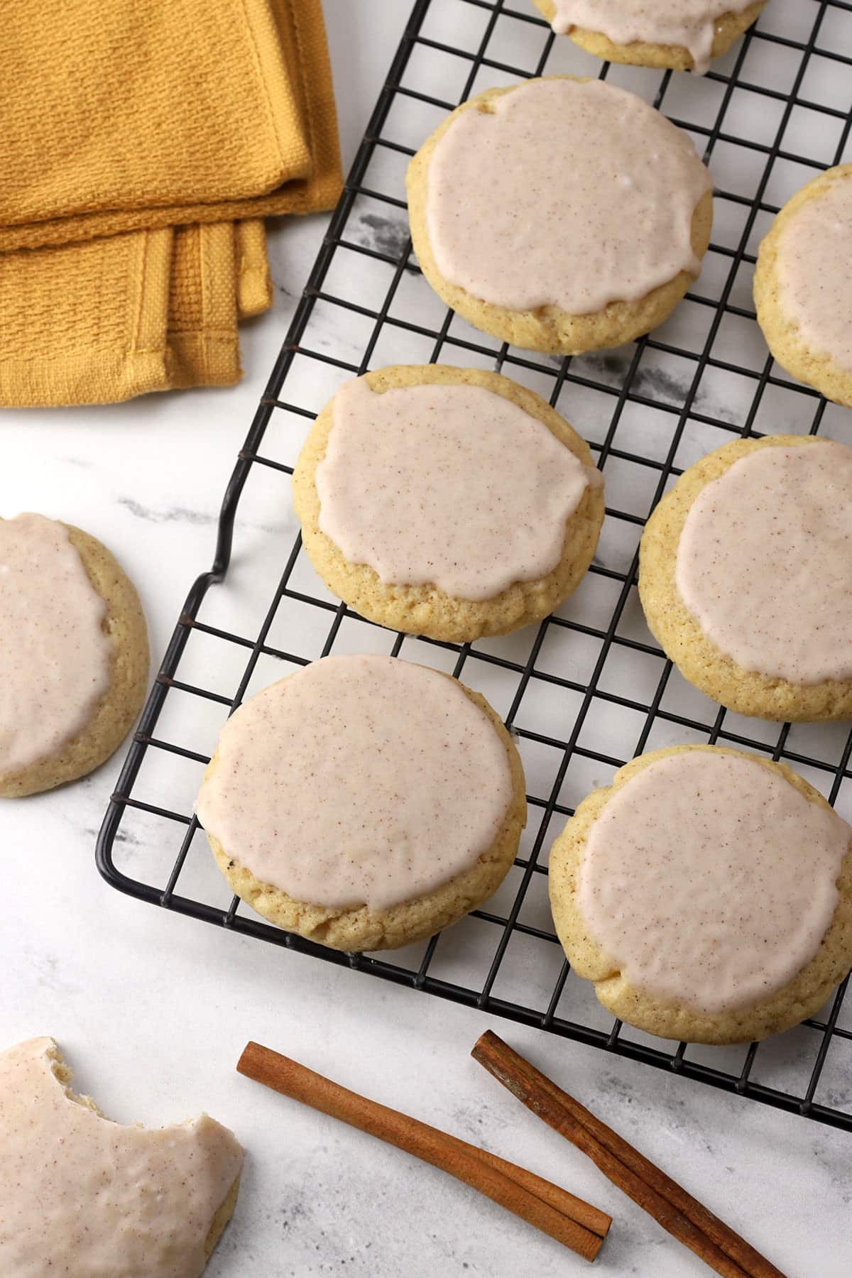 soft-baked sugar cookie rounds on a cooling rack, cozy kitchen setting
