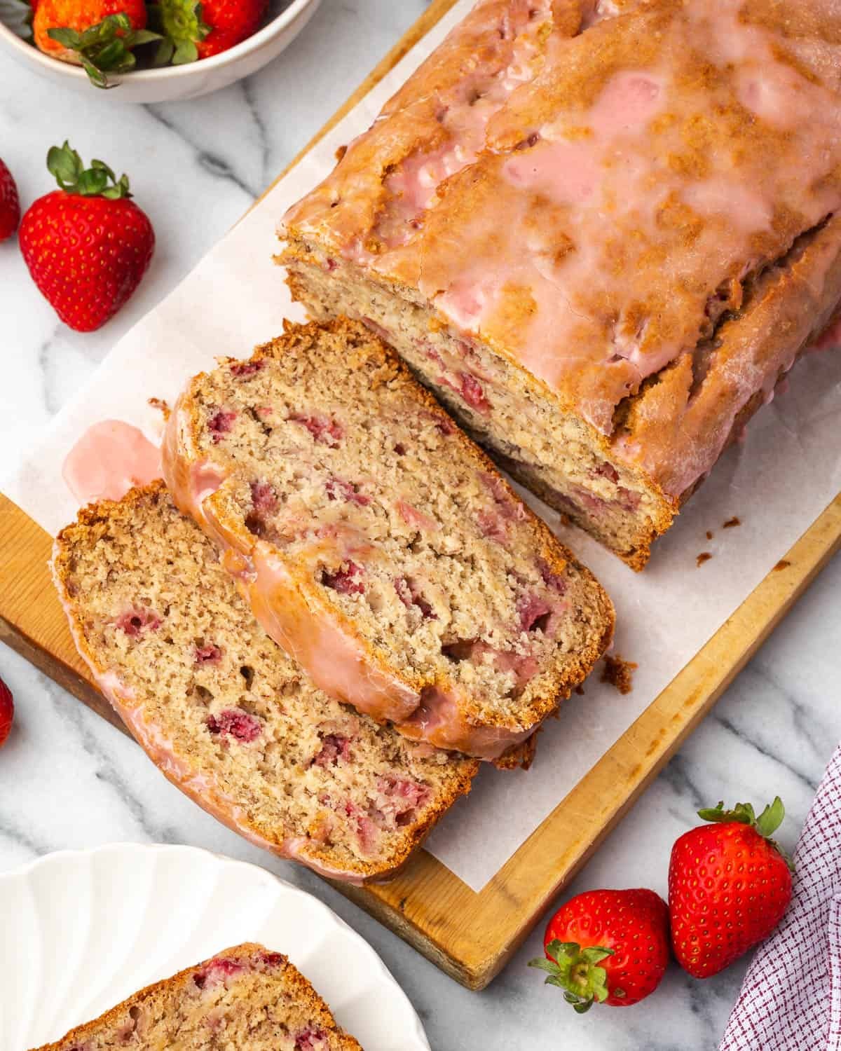 Strawberry Daiquiri Banana Bread with a slice cut open