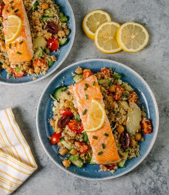 salmon fillet with roasted vegetables and quinoa bowl