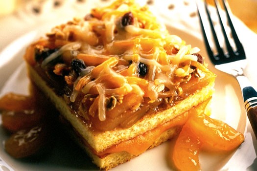 lasagna with apples and cheddar being served