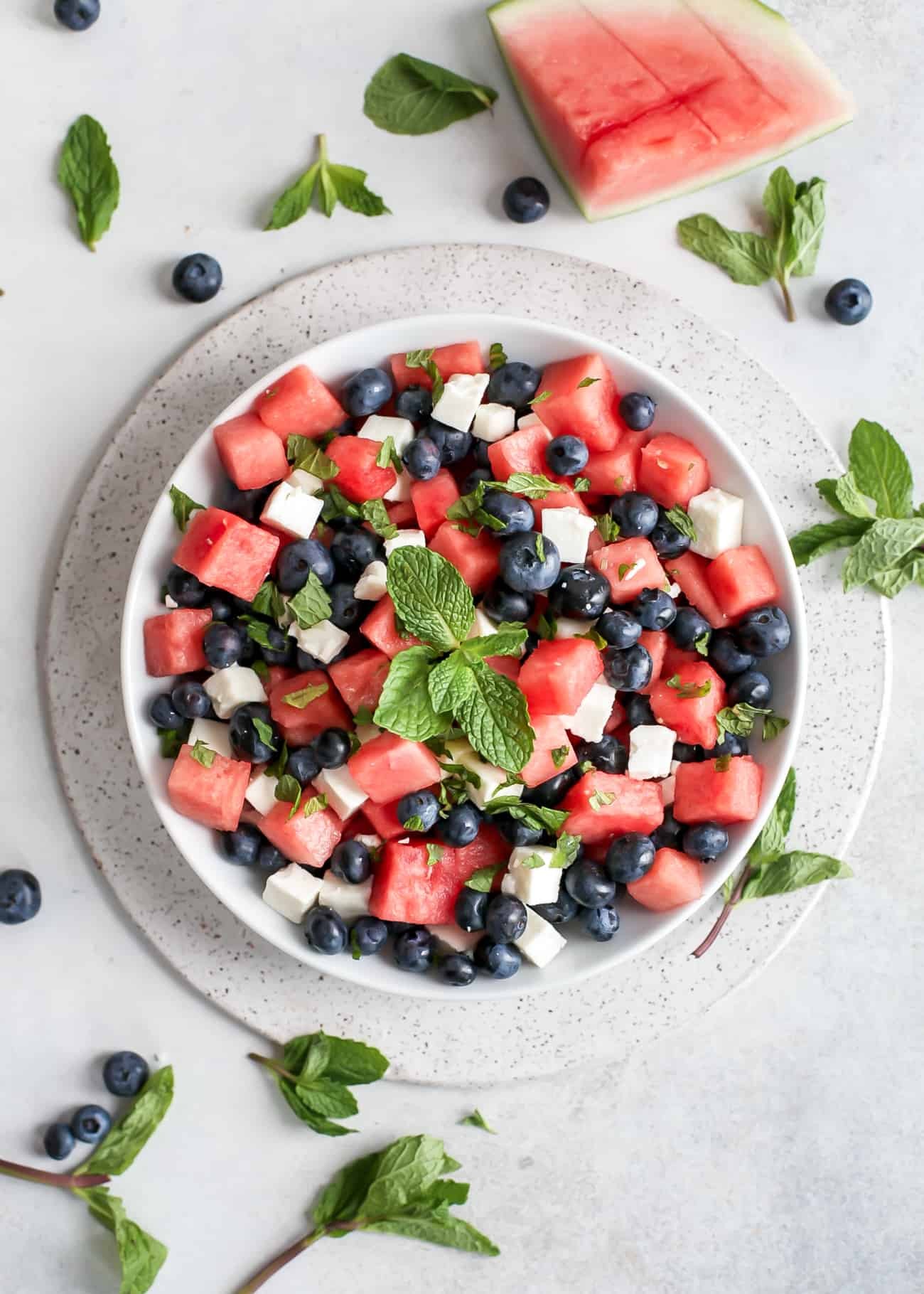 refreshing watermelon blueberry salad with goat cheese and almonds