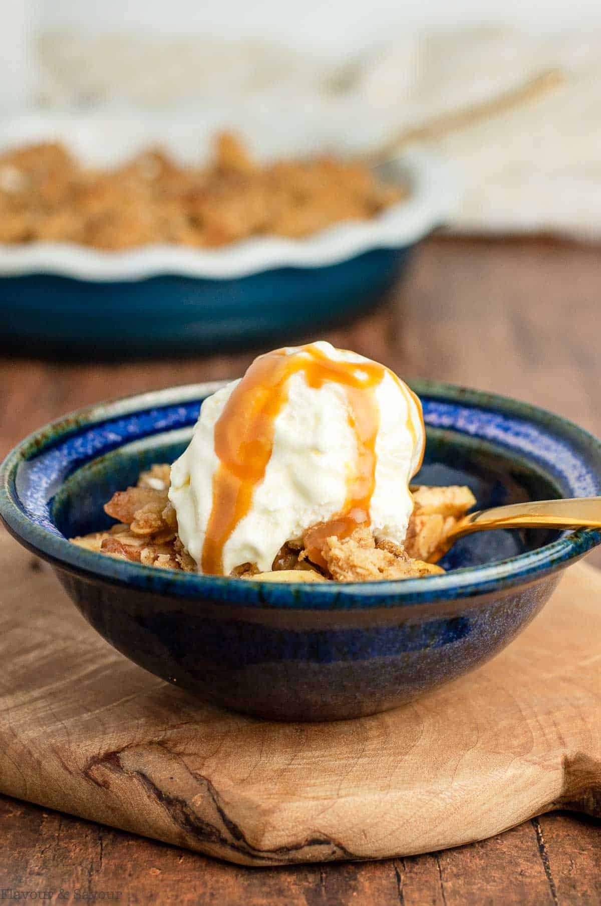 golden brown apple crisp with whiskey caramel drizzle