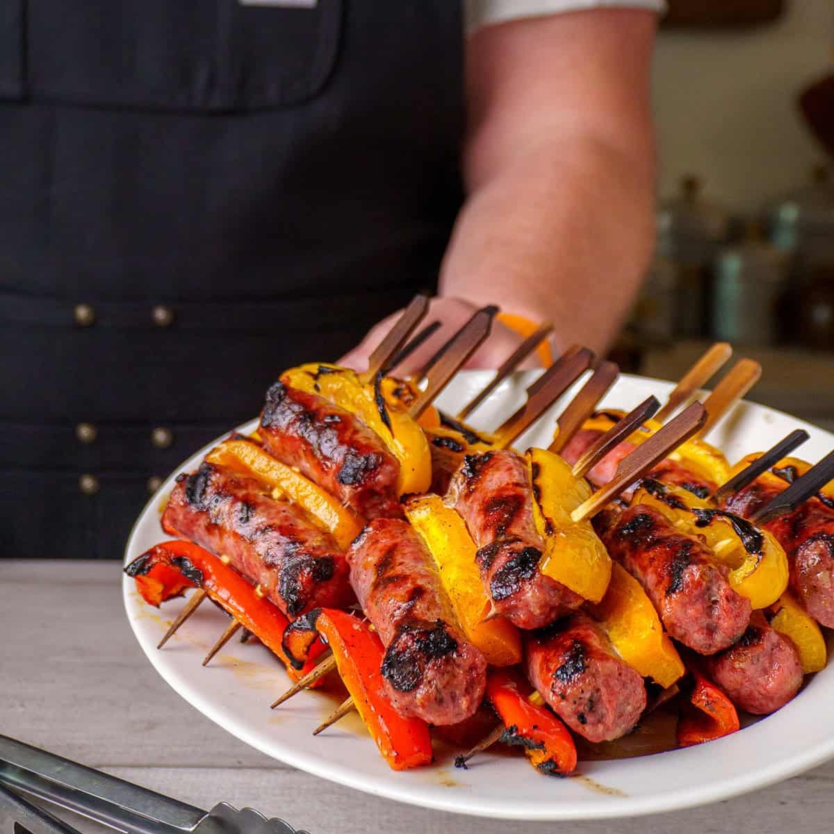 grilled sausage and pepper skewers drizzled with balsamic glaze