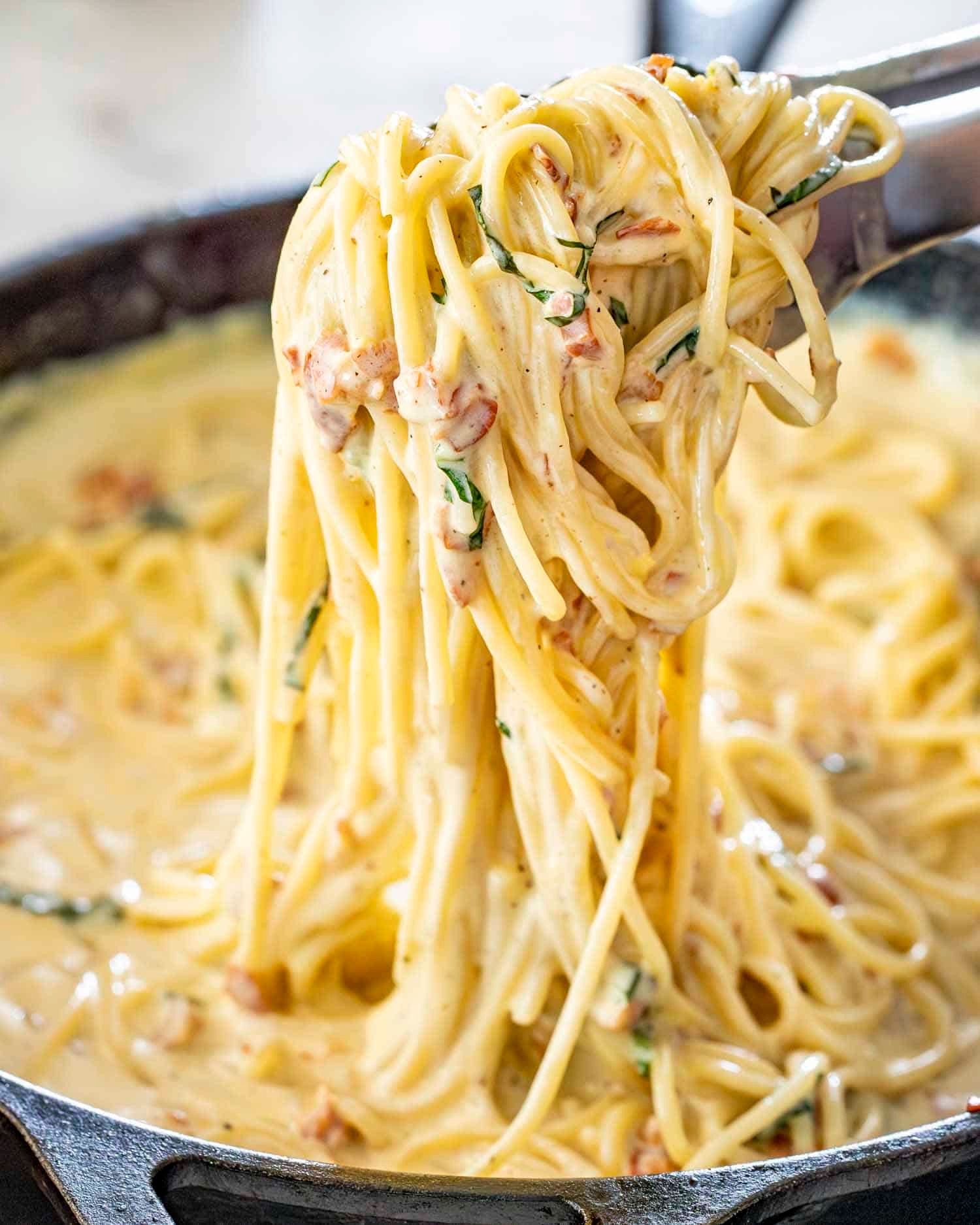 creamy carbonara being served