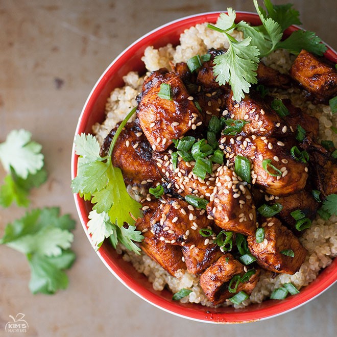Sriracha chicken quinoa bowl with vibrant vegetables