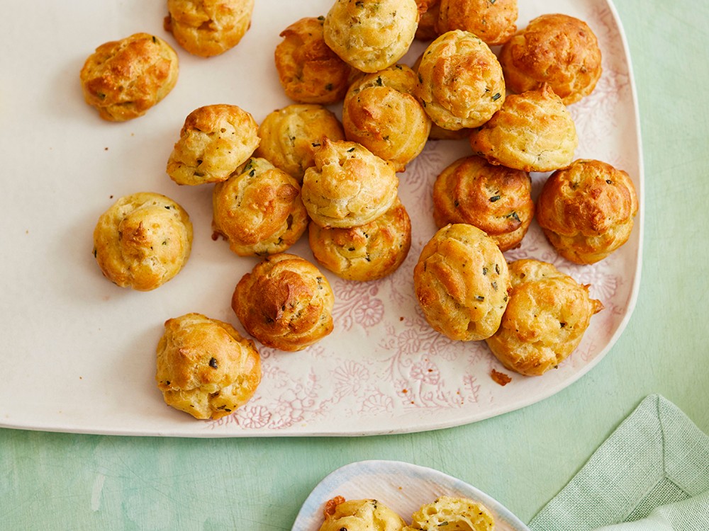 golden brown savory cheese puffs fresh from oven