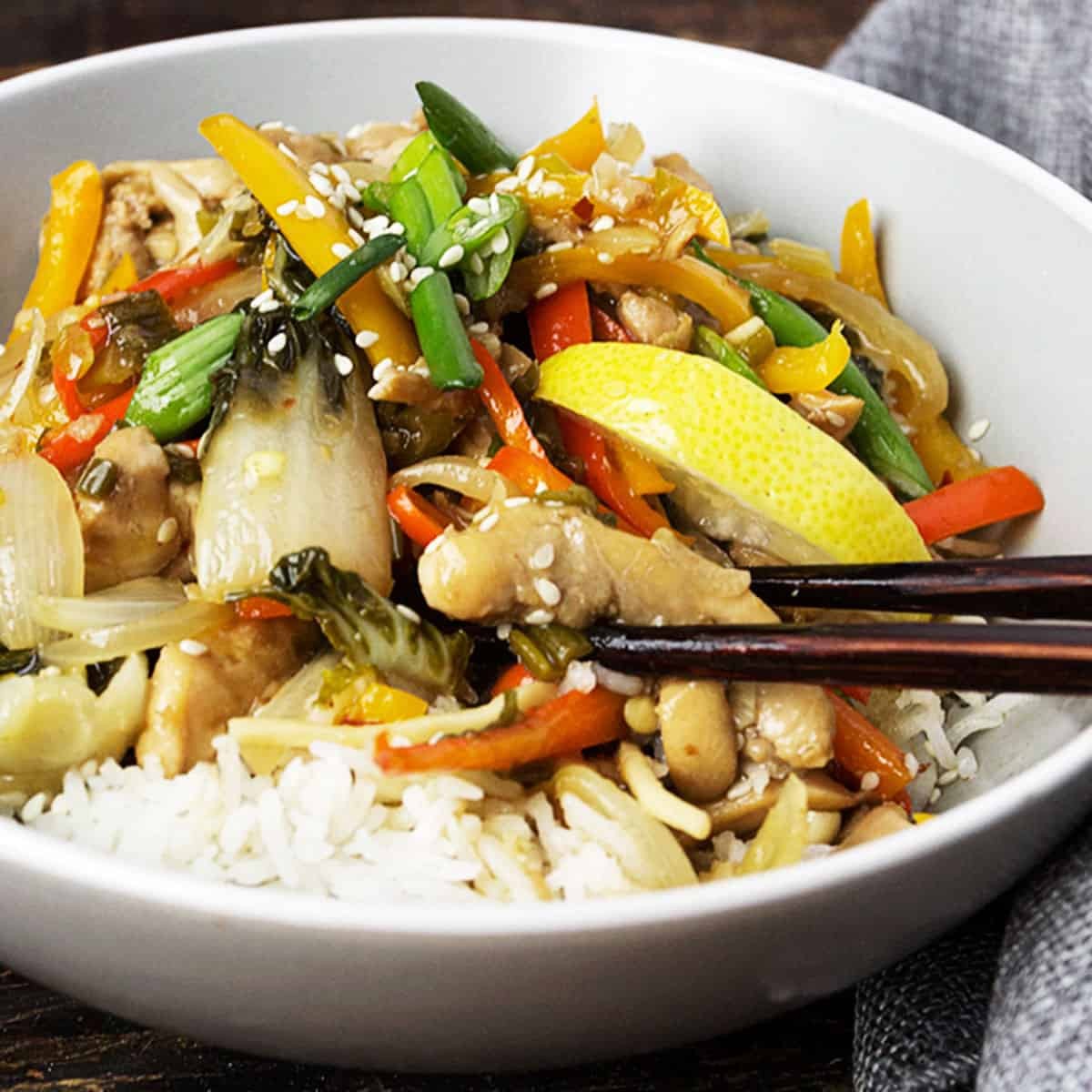 lemon garlic herb chicken stir-fry in a wok