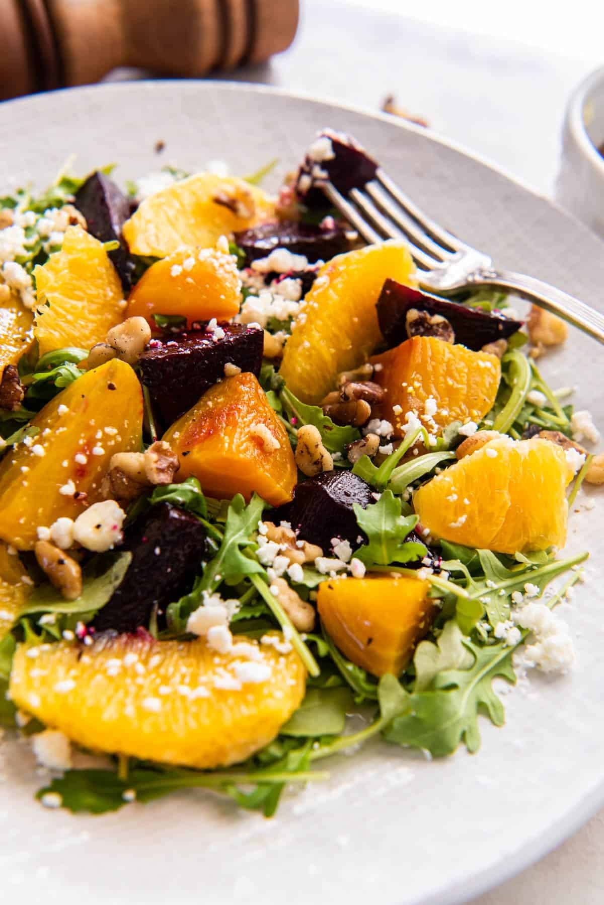 colorful roasted beet and citrus salad with fresh herbs and a zesty dressing