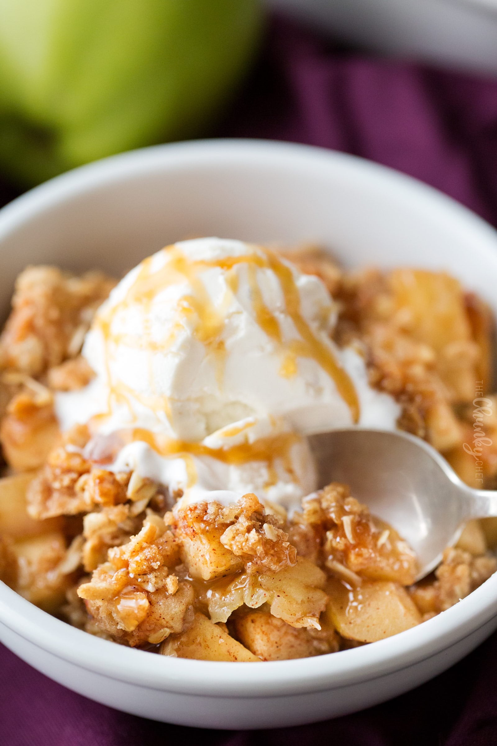 golden apple crisp with vanilla ice cream scoop