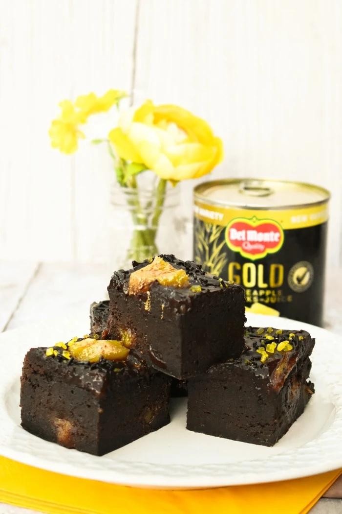 vegan brownies topped with pineapple salsa