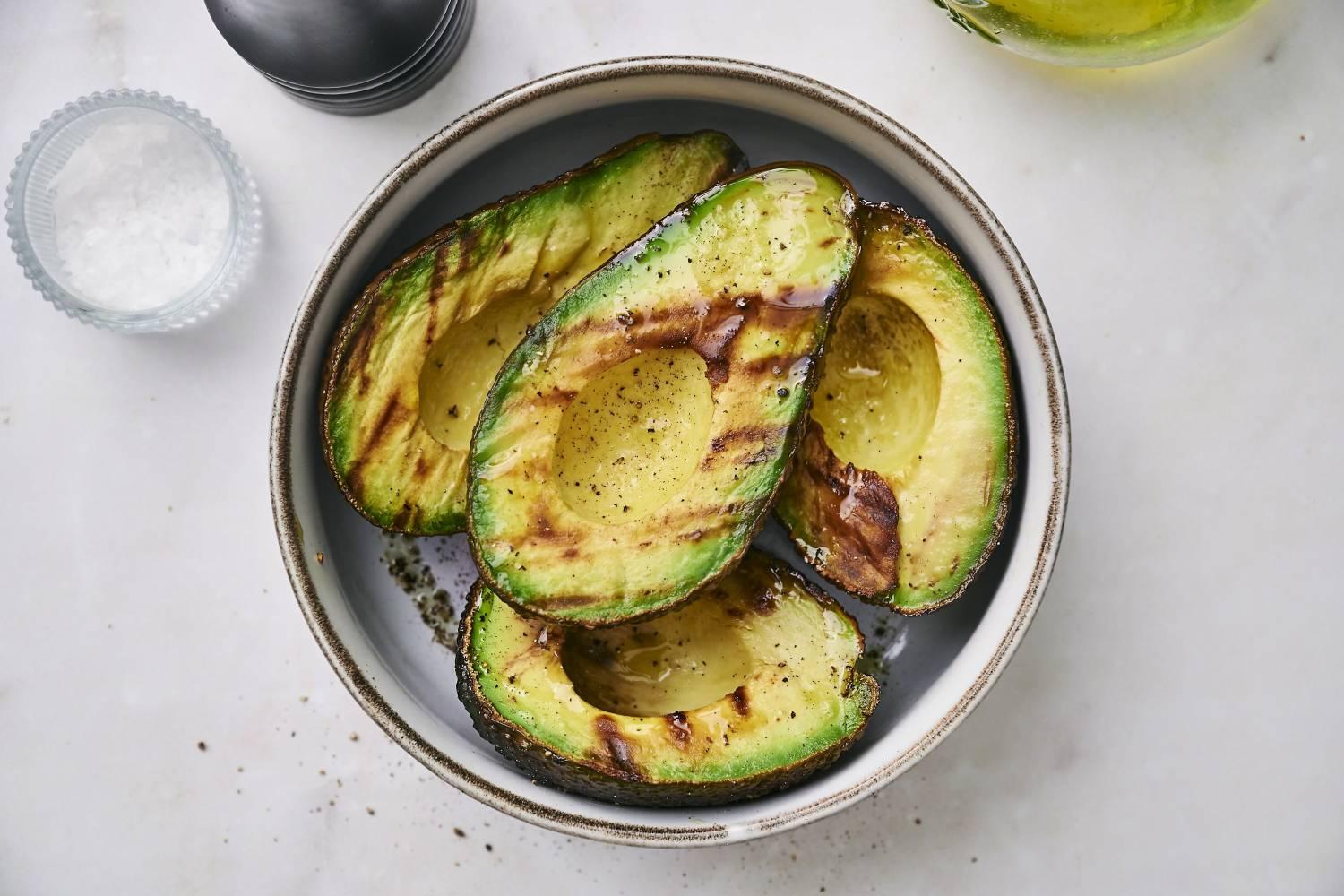 grilled avocado halves drizzled with balsamic glaze and sprinkled with sea salt