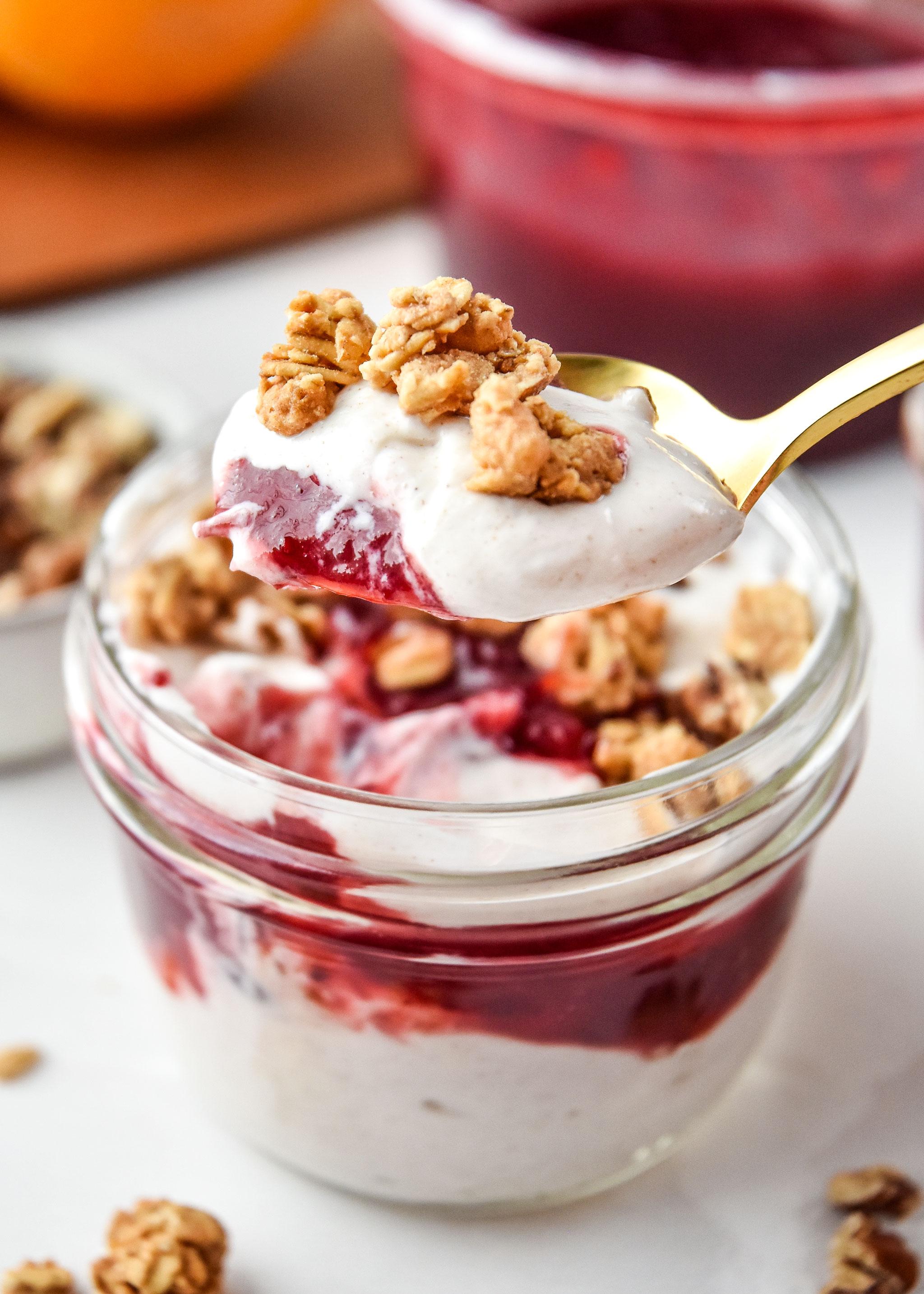 cranberry orange yogurt parfait in a glass