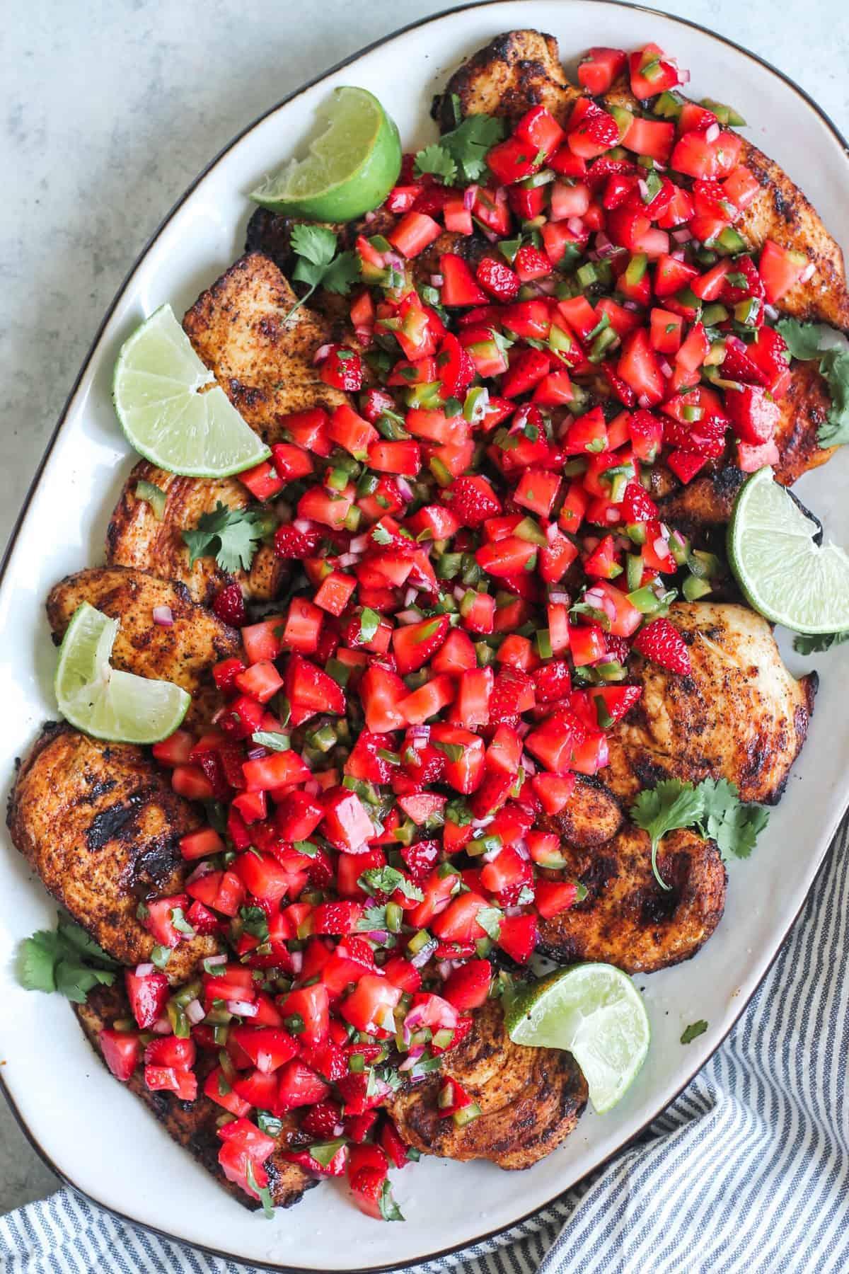 grilled chicken topped with fresh strawberry salsa